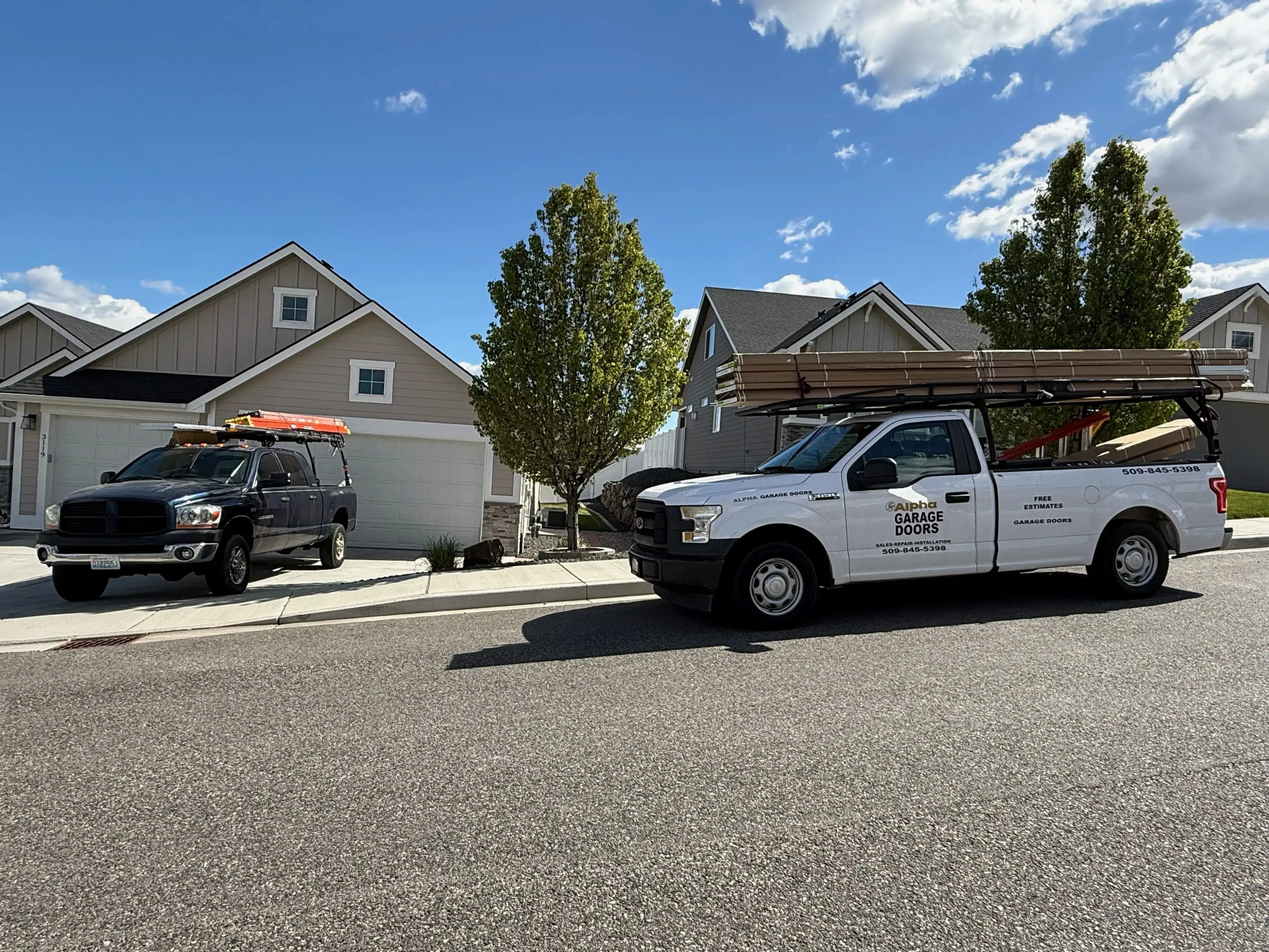 Company vehicles parked outside of residence